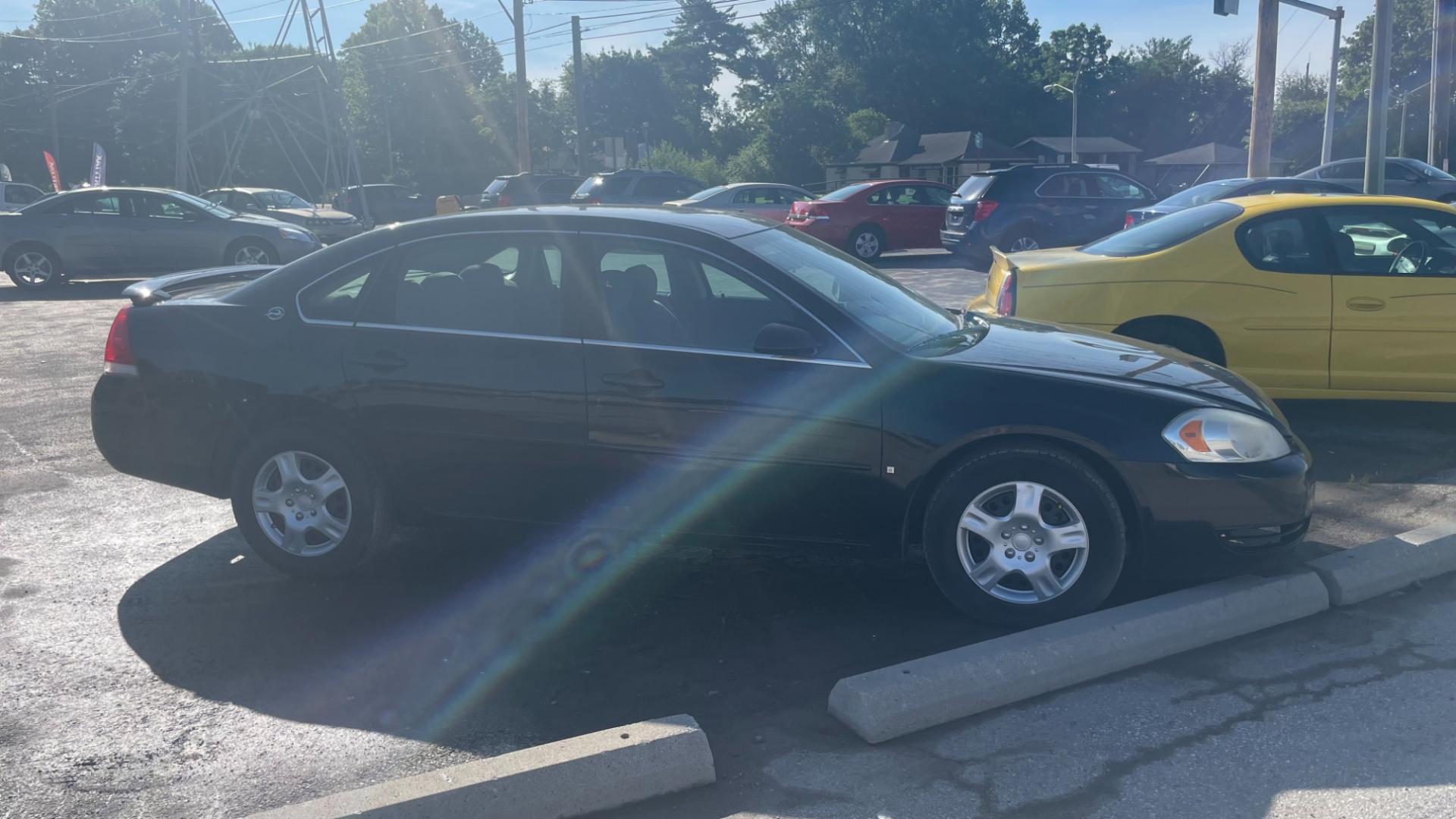 2007 BLACK /GRAY Chevrolet Impala LS (2G1WB58K279) with an 3.5L V6 OHV 16V FFV engine, 4-Speed Automatic Overdrive transmission, located at 2710A Westlane Rd., Indianapolis, IN, 46268, (317) 291-2000, 39.885670, -86.208160 - Photo#1